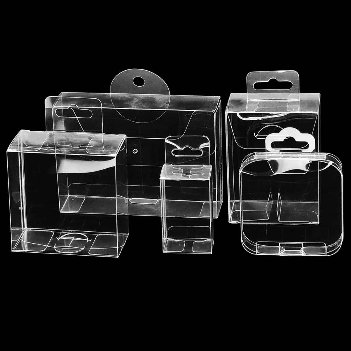 Unbranded physical clear boxes showing hanging-tab and top-closure structures