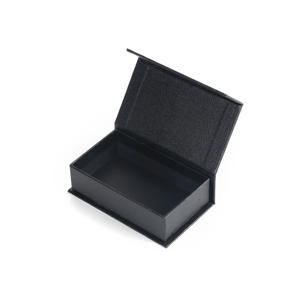 Black magnetic closure rigid gift box photographed open as a physical structure reference