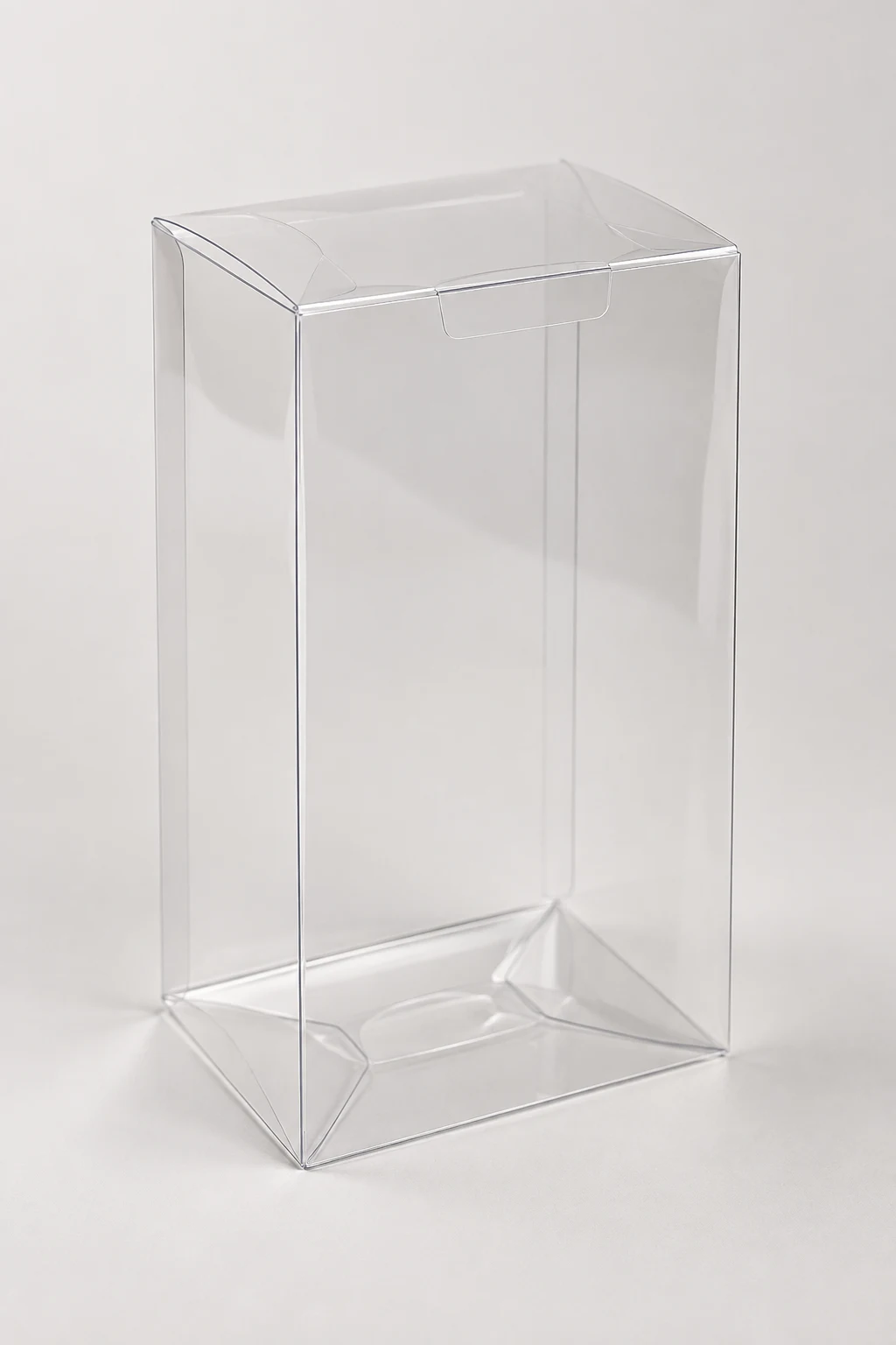 MUGE design-direction concept of an empty clear PET lock-bottom display box with visible fold lines