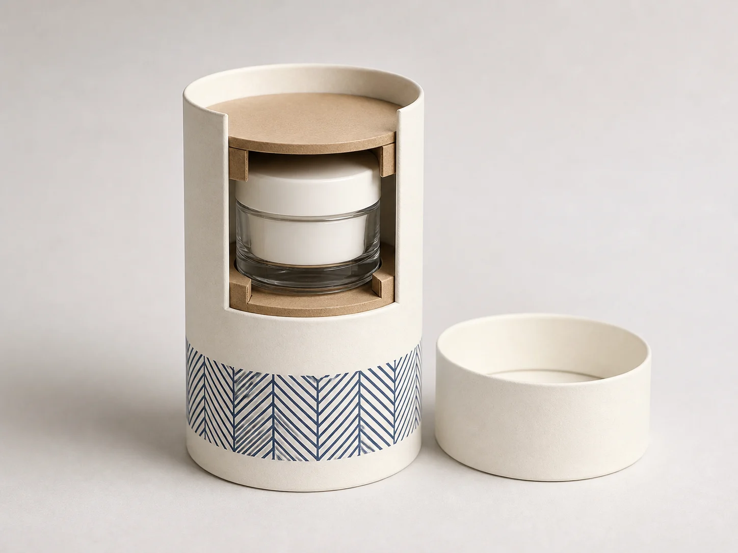 MUGE design-direction concept showing an unbranded paper tube with separate paperboard end supports holding a generic glass jar